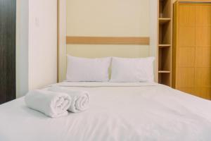 FREE WIFI, NETFLIX, SMART TV, MINERAL WATER, AMENITIES - Studio with Foldable Wall Bed at Serpong Garden Apt