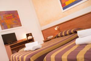 Triple Room with Balcony room in Hotel Antille e Azzorre