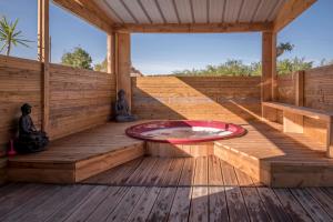 Maisons de vacances La Colline aux Chalets, Jaccuzi, Sauna : photos des chambres