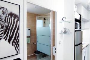 RAVAS Studio climatisé terrasse proche commerces