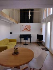 Appartements Loft avec jardin en ville et parking : photos des chambres