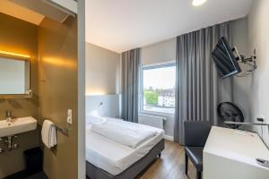 Single Room room in mk hotel stuttgart