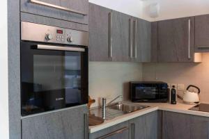 Stylish 1BDR Apt wHuge BalconyShared Roof Pool