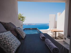 Honeymoon Suite with heated Plunge Pool and Caldera View room in Galaxy Suites & Villas