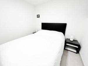 Appartements Kiwi - Cosy T2 - Clim Wifi : photos des chambres
