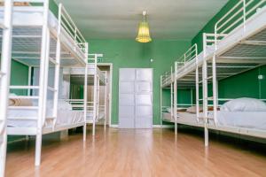 Bed in 12-Bed Mixed Dormitory Room room in Urban Garden Hostel