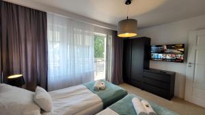 GoldenApart Willa- Apartamenty 2-sypialniowe - grzany basen -taras