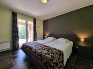 Villas Le Jardin des Olives : photos des chambres