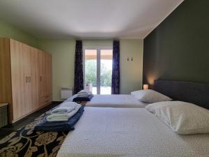 Villas Le Jardin des Olives : photos des chambres