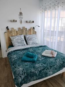 Appartements L'appart' du bord de mer 150m de la plage : photos des chambres