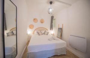 Appartements 4 couchages aux pieds des musees - Parking et WiFi : photos des chambres