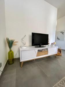 Appartements Studio Neuf a 10min Plage & Centre-Ville + Garage : photos des chambres