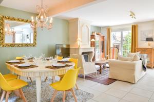 Maisons de vacances Magnolia - Charmante maison avec jardin : photos des chambres