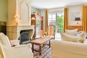 Maisons de vacances Magnolia - Charmante maison avec jardin : photos des chambres