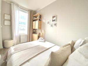 Appartements chaleureux - 15 min a pied de la gare : photos des chambres