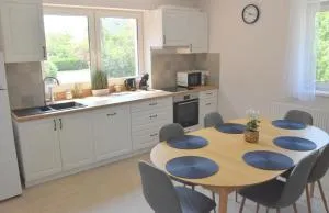 Vöröskő Apartmanház - Lucernás