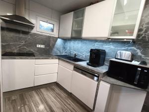 Maisons de vacances Appartement Le Secret Spa billard sensualite : photos des chambres