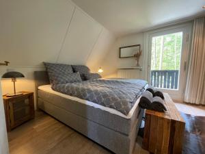 Ferienhaus mit Teich auf 16.000m² in der Natur