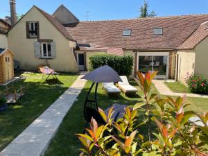 Maisons de vacances jolie maison de campagne avec piscine interieur chauffee : photos des chambres