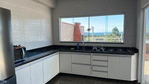 Casa com spa em Caraguatatuba