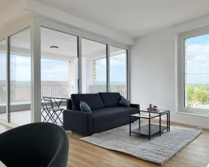 Moderne Apartments im Herzen der Stadt I private Tiefgarage mit Ladesäulen I home2share - Riesenbeck