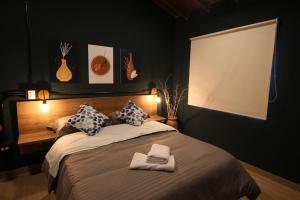 Apartamento cerca Unidad Deportiva Belén - ONE202 By Roots Rentals