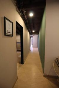 Apartamento cerca Unidad Deportiva Belén - ONE202 By Roots Rentals