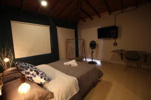 Apartamento cerca Unidad Deportiva Belén - ONE202 By Roots Rentals