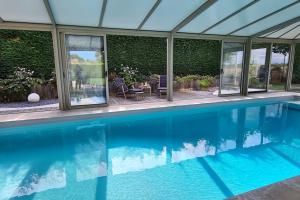 Villas Villa 5*, mer a 3 mn, piscine interieure a 28° : photos des chambres