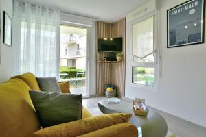 Appartements Escapade a Dinan - Appartement avec jardin et parking prive : photos des chambres