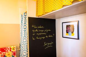 Appartements Mia Casa - Studio Gauguin - central, artistique et calme : photos des chambres