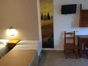 Quadruple Room with Sea View room in Hostal Puerto Beach