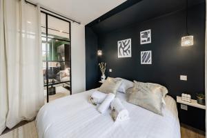 Appartements L'Azur - Superbe appartement chic et cosy : photos des chambres