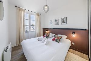 Appartements L'Azur - Superbe appartement chic et cosy : photos des chambres