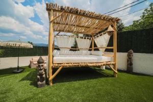 B&B / Chambres d'hotes O Balinais mini villa avec spa et piscine privatif : photos des chambres