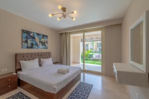 Cozy 1-Bedroom Apartment in Mangroovy, El Gouna. Private terrace, garden and pool access
