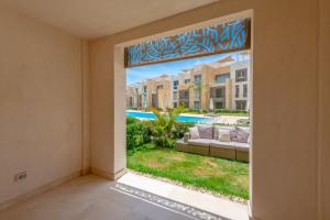 Cozy 1-Bedroom Apartment in Mangroovy, El Gouna. Private terrace, garden and pool access
