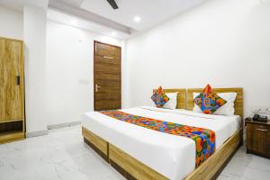 FabHotel New Silver Crown