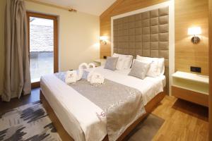 Two-Bedroom Apartment room in Hotel Passpartù Home Garni
