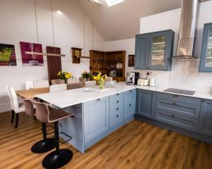 Beachside period family home. 5 BR spacious, comfortable.