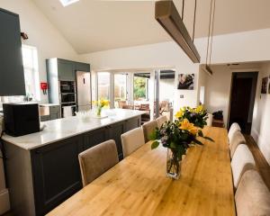 Beachside period family home. 5 BR spacious, comfortable.