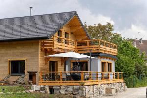 Chalets Chalet au coeur du Jura a 5min de la plage de Clairvaux : photos des chambres