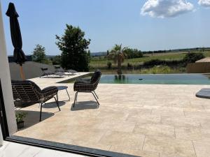 Villas Villa piscine a debordement : photos des chambres