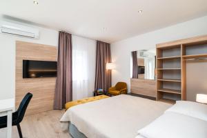 Studio with Balcony room in Bacan Serviced Apartments