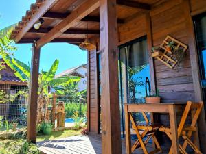 Chalés Praia do Rosa piscina compartilhada