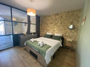 Appartements Gite « domaine de l’oustal nau » : photos des chambres