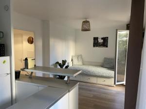 Appartements Studio 28 m2 & jardin privatif 20 m2 : photos des chambres