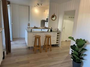 Appartements Studio 28 m2 & jardin privatif 20 m2 : photos des chambres