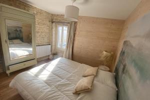 Maisons de vacances Charming little house with exposed stonework : photos des chambres