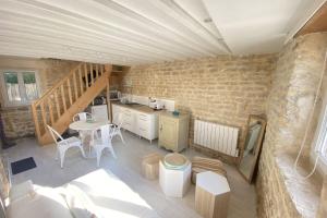 Maisons de vacances Charming little house with exposed stonework : photos des chambres